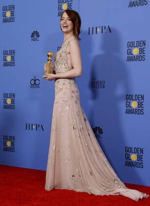 Emma Stone, winner of the award for Best Performance by an Actress in a Motion Picture Musical or Comedy for La La Land appears backstage with her trophy during the 74th annual Golden Globe Awards at the Beverly Hilton Hotel in Beverly Hills, California on January 8, 2017.  LAP201701084026 JIMxRUYMEN