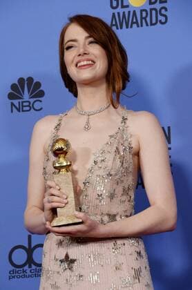 Emma Stone, winner of the award for Best Performance by an Actress in a Motion Picture Musical or Comedy for La La Land appears backstage with her trophy during the 74th annual Golden Globe Awards at the Beverly Hilton Hotel in Beverly Hills, California on January 8, 2017.  LAP201701084027 JIMxRUYMEN