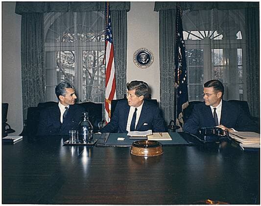 April 13, 1962 - Washington, District of Columbia, United States of America - United States President John F. Kennedy meets the Shah of Iran, Mohammad Reza Shah Pahlavi, in the Cabinet Room at the White House on April 13, 1962. Left to right: Shah Pahlavi, President Kennedy, U.S. Secretary of Defense Robert McNamara..Credit: - The White House via CNP Washington United States of America - ZUMAs152 19620413_zaa_s152_002