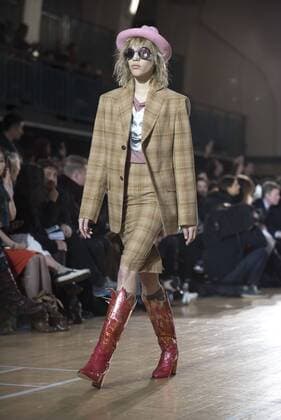 London: Vivienne Westwood Fashion Show Vivienne Westwood s runway at LFW Men s January 2017. A model walks the runway at the Vivienne Westwood show during London Fashion Week Men s collections at Seymour Leisure Centre. Dame Vivienne Isabel Westwood is a British fashion designer and businesswoman, largely responsible for bringing modern punk and new wave fashions into the mainstream. Westwood came to public notice when she made clothes for Malcolm McLaren s boutique in the King s Road, which became famous as SEX  AlbertoxPezzali