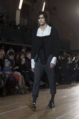 London: Vivienne Westwood Fashion Show Vivienne Westwood s runway at LFW Men s January 2017. A model walks the runway at the Vivienne Westwood show during London Fashion Week Men s collections at Seymour Leisure Centre. Dame Vivienne Isabel Westwood is a British fashion designer and businesswoman, largely responsible for bringing modern punk and new wave fashions into the mainstream. Westwood came to public notice when she made clothes for Malcolm McLaren s boutique in the King s Road, which became famous as SEX  AlbertoxPezzali