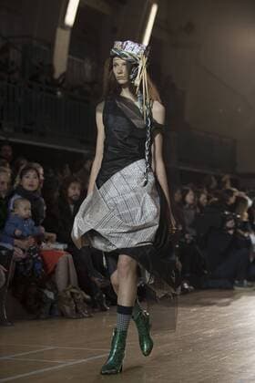 London: Vivienne Westwood Fashion Show Vivienne Westwood s runway at LFW Men s January 2017. A model walks the runway at the Vivienne Westwood show during London Fashion Week Men s collections at Seymour Leisure Centre. Dame Vivienne Isabel Westwood is a British fashion designer and businesswoman, largely responsible for bringing modern punk and new wave fashions into the mainstream. Westwood came to public notice when she made clothes for Malcolm McLaren s boutique in the King s Road, which became famous as SEX  AlbertoxPezzali