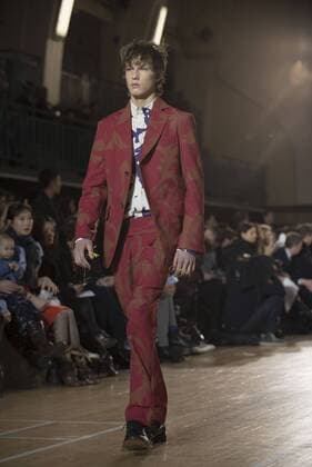 London: Vivienne Westwood Fashion Show Vivienne Westwood s runway at LFW Men s January 2017. A model walks the runway at the Vivienne Westwood show during London Fashion Week Men s collections at Seymour Leisure Centre. Dame Vivienne Isabel Westwood is a British fashion designer and businesswoman, largely responsible for bringing modern punk and new wave fashions into the mainstream. Westwood came to public notice when she made clothes for Malcolm McLaren s boutique in the King s Road, which became famous as SEX  AlbertoxPezzali