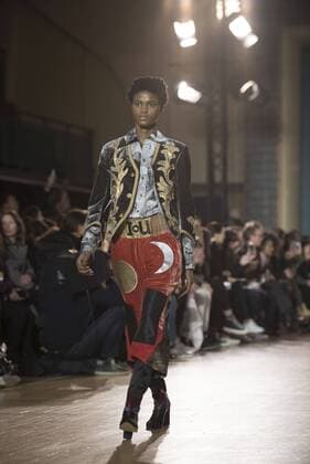 London: Vivienne Westwood Fashion Show Vivienne Westwood s runway at LFW Men s January 2017. A model walks the runway at the Vivienne Westwood show during London Fashion Week Men s collections at Seymour Leisure Centre. Dame Vivienne Isabel Westwood is a British fashion designer and businesswoman, largely responsible for bringing modern punk and new wave fashions into the mainstream. Westwood came to public notice when she made clothes for Malcolm McLaren s boutique in the King s Road, which became famous as SEX  AlbertoxPezzali