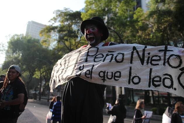 January 9, 2017 - Mexico City, Mexico - A man dressed a a clown protest against fuel prices in Mexico City, on 9 January 2017. Largely peaceful protests against the fuel price increases continued nationwide in Mexico, and looting seen last week largely subsided. The protests have left hundreds of businesses looted and more than 1,500 detained. Mexico City Mexico  - ZUMAn230 20170109_zaa_n230_047