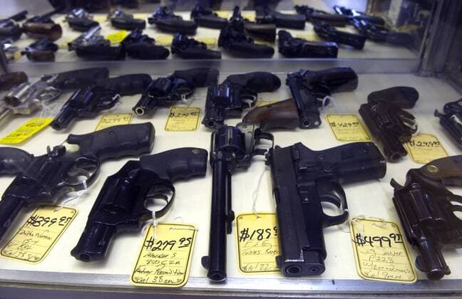 Dec 03, 2007 - Smyrna, Georgia, USA - An array of handguns for sale at the Candler Road Gun & Pawn Shop in Decatur, Georgia on Wednesday, December 5, 2007. Phillips store was visited by New York City investigators, but is not involved in Mayor Bloomberg s federal suit. - ZUMAl17_ 20071203_kri_l17_284