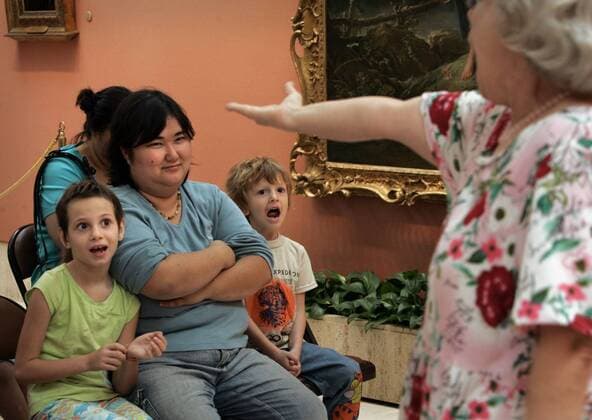 Nov 04, 2006; San Diego, CA, USA; Audience members ASHLEY MORRIS, 7, left, JENNIFER MORRIS, 23, and VINCENT MORRIS, 4, react as storyteller HARLYNNE GEISLER, right, tells many intricate tales to a young audience Saturdays at the Timken Museum in Balboa Park. (JENNIFER is a step-aunt to the children, not their mother). She brings to life the stories behind major works of art, and their artists. Mandatory - ZUMAs44_ 20061104_mdm_s44_409