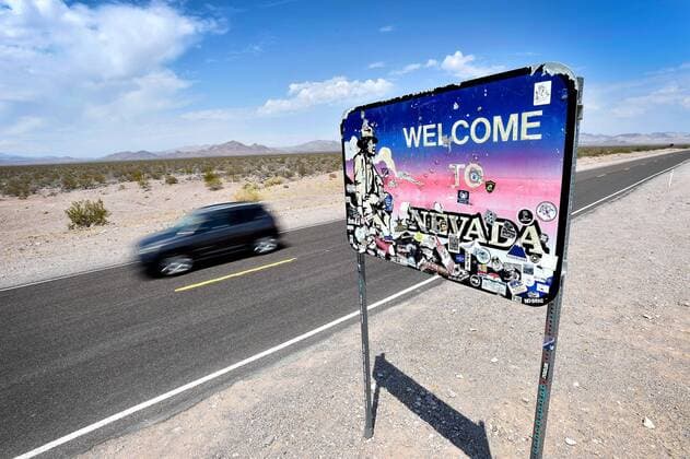 Aug. 22, 2016 - Death Valley National Park, U.S. - A car travels along Nevada Highway 374 leading to Death Valley s Hell s Gate is seen at the Nevada and California state line. Beatty USA - ZUMAbk3_ 20160822_zaf_bk3_005