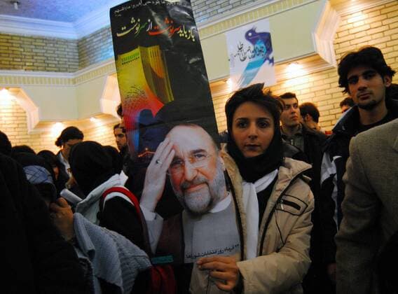 Dec 05, 2006; Tehran, IRAN; An Iranian girl holds a poster of former Iranian President Mohammad Khatami, as she attends a gathering of Iranian youth reformists in Tehran, Iran. Mandatory - ZUMAh68_ 20061205_cob_h68_476