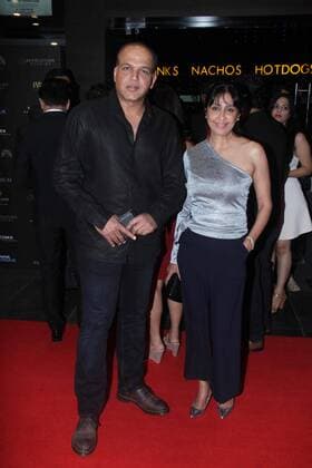MUMBAI, INDIA - JANUARY 12: Bollywood director Ashutosh Gowariker with his wife Sunita at the red carpet of premier of xXx: Return of Xander Cage movie, on January 12, 2017 in Mumbai, India. xXx: Return of Xander Cage is a 2017 American action film directed by D. J. Caruso and written by F. Scott Frazier. It stars Vin Diesel, Donnie Yen, Deepika Padukone, Kris Wu, Ruby Rose, Tony Jaa, Nina Dobrev, Toni Collette and Samuel L. Jackson. It is the third film in the xXx franchise and a sequel to both xXx (2002) and xXx: State of the Union (2005). (Photo by Pramod Thakur Hindustan Times ) Premier Of xXx: Return of Xander Cage Movie Held In Mumbai
