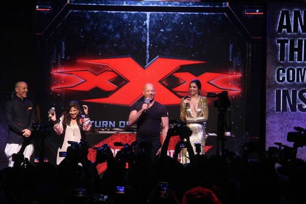MUMBAI, INDIA - JANUARY 12: Hollywood actor Vin Diesel and Bollywood actor Deepika Padukone during a meet and greet with fans to promote the film xXx: Return of Xander Cage , on January 12, 2017 in Mumbai, India. . xXx: Return of Xander Cage is a 2017 American action film directed by D. J. Caruso and written by F. Scott Frazier. It stars Vin Diesel, Donnie Yen, Deepika Padukone, Kris Wu, Ruby Rose, Tony Jaa, Nina Dobrev, Toni Collette and Samuel L. Jackson. It is the third film in the xXx franchise and a sequel to both xXx (2002) and xXx: State of the Union (2005). (Photo by Pramod Thakur Hindustan Times ) Hollywood Actor Vin Diesel And Bollywood Actor Deepika Padukone Meet Fans In Mumbai