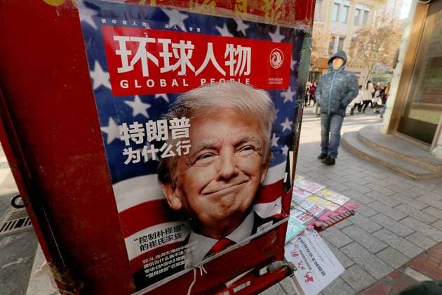 A leading Chinese magazine featuring a front-page story on U.S. President-elect Donald Trump is sold on the streets of Beijing on January 15, 2017. Chinese media is strictly controlled by the government, with all stories having to be approved by state censors. China s foreign ministry on Sunday again rejected Trump s suggestion that he might use American policy on Taiwan as a bargaining chip between the two countries.  PEK2017011503 STEPHENxSHAVER