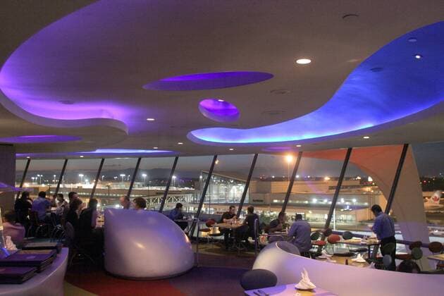 Aug 29, 2006; Los Angeles, CA, USA; At the center of Los Angeles International Airport stands the landmark Theme Building which is home to the spectacular Encounter Restaurant and Bar. With 135-foot high parabolic arches and a futuristic design, the structure is certainly unique and has become one of the most recognizable buildings in the U.S. The building is surrounded by lush gardens, including a courtyard with plaques commemorating the opening of the new jet-age airport in 1961 and LAX s first employee in 1928, Henry Bakes. The Theme Building was completed in August 1961 at a cost of $2.2 million; and the Encounter Restaurant, with its space-age interior and spectacular exterior lighting, opened in January 1997, serving a variety of cuisine and offering 360 degree views of the airport. Pictured: A view of the restaurant and bar inside Encounter at LAX. Mandatory  - ZUMA 20060829_lax_m69_886