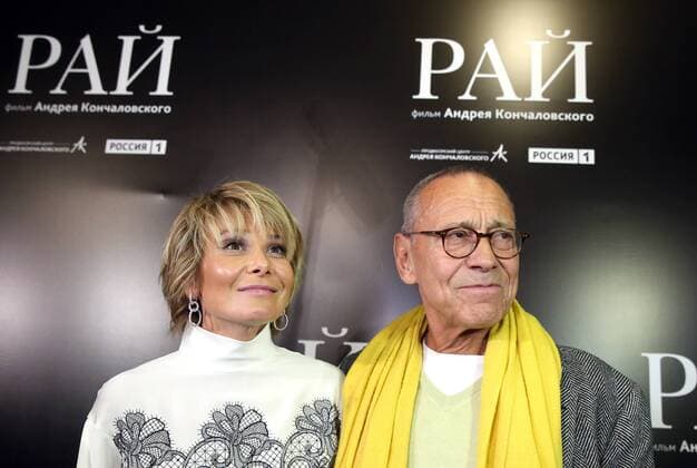 MOSCOW, RUSSIA - JANUARY 18, 2017: Russian film director Andrei Konchalovsky with his wife Julia Yulia Vysotskaya at the Moscow premiere of his latest drama film Paradise at the Karo 11 Oktyabr cinema. Artyom Geodakyan TASS  TS03E4FA