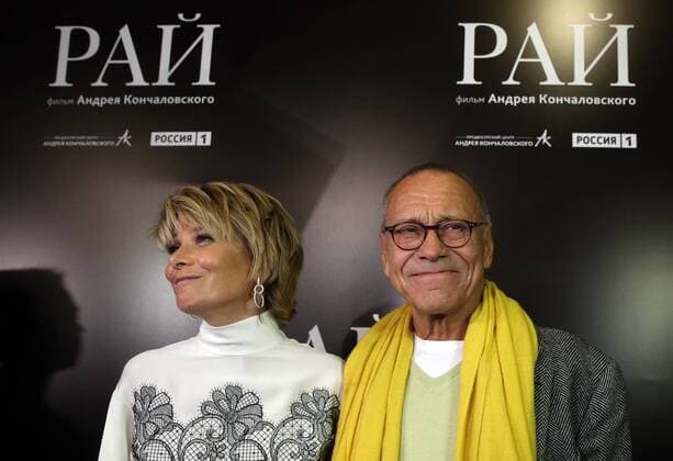 MOSCOW, RUSSIA - JANUARY 18, 2017: Russian film director Andrei Konchalovsky with his wife Julia Yulia Vysotskaya at the Moscow premiere of his latest drama film Paradise at the Karo 11 Oktyabr cinema. Artyom Geodakyan TASS  TS03E511