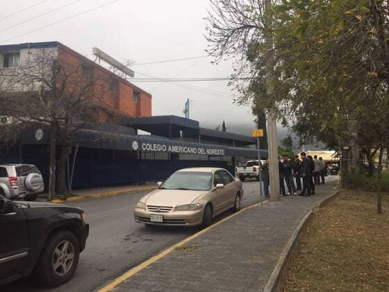 (170118) -- MONTERREY (MEXICO), Jan. 18, 2017 -- People gather outside the American School of the Northeast, where a shooting occurred, in Monterrey, Nuevo Leon state, Mexico, on Jan. 18, 2017. At least five people, including four teenagers and one teacher, were critically injured early Wednesday, after a student opened fire in their classroom at the private school. ) MEXICO-MONTERREY-SCHOOL-SHOOTING ABCxNewspaper