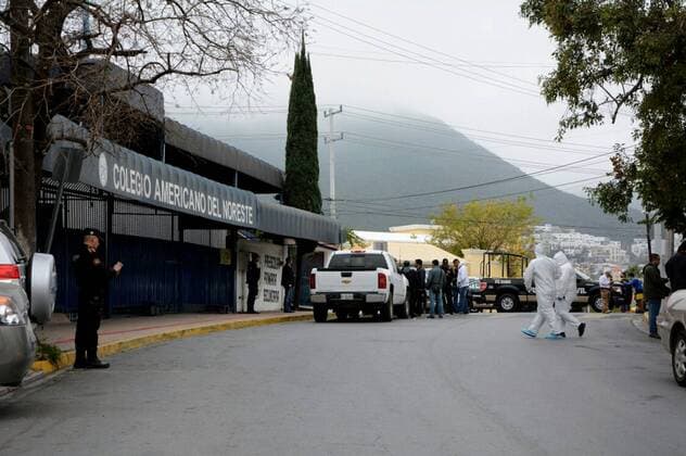 (170118) -- MONTERREY (MEXICO), Jan. 18, 2017 -- People gather outside the American School of the Northeast where a shooting occurred in Monterrey, Nuevo Leon state, Mexico, on Jan. 18, 2017. At least five people, including four teenagers and one teacher, were critically injured early Wednesday, after a student opened fire in their classroom at the private school. ) MEXICO-MONTERREY-SCHOOL-SHOOTING STR 