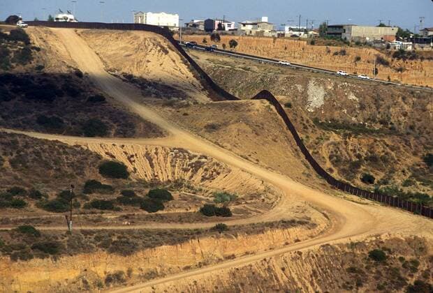 January 25, 2107 - File - President Trump signed executive orders to begin the construction of a wall on the US-Mexico border, boosting border patrol forces and increasing the number of immigration enforcement officers who carry out deportations. Pictured: May 01, 1996 - San Diego, California, USA - The San Diego Sector is one of nine Border Patrol sectors along the United States - Mexico border. It is responsible for patrolling the first 66 miles of the United States - Mexico border starting from the Pacific Ocean, and covers approximately 7,000 square miles of southwest California. The Sector is located directly north of Tijuana and Tecate, Mexico, cities with a combined population of two million people. There is no natural barrier between the United States and Mexico in the San Diego Sector. PICTURED: The US Border wall and the patrolling avoid illegal entering into the country. San - ZUMAa01_ 20170125_sho_a01_087 Copyright: xJonathanxAlcorn