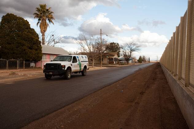 January 25, 2107 - File - President Trump signed executive orders to begin the construction of a wall on the US-Mexico border, boosting border patrol forces and increasing the number of immigration enforcement officers who carry out deportations. Pictured: Jan. 28, 2013 - Douglas, Arizona, U.S - A U.S. Border patrol agent drives between some houses in Douglas, Ariz. that abut the U.S.-Mexico border wall separating Douglas from neighboring Agua Prieta, Sonora, Mex. Douglas U.S. - ZUMAs117 20170125_sho_s117_097 Copyright: xWillxSebergerx