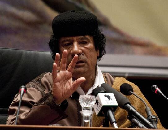 Oct. 20, 2011 - FILE PHOTO - Muammar Gaddafi is dead, Libya s new leaders said, killed by fighters who overran his home town and final bastion. His bloodied body was stripped and displayed around the world from cellphone video. Gaddafi, was the autocratic ruler of Libya, from 1969 when he seized power in a military coup and became the longest-serving leader in both Africa and the Arab world. He was born in the desert near Sirte in 1942, and was known for his flamboyant dress-sense and gun-toting female body guards. His relationship with the rest of the world was erratic. Gaddafi was known in the West as a pariah, was responsible for the 1988 bombing of a Pan Am jumbo jet over Lockerbie, which killed 270 people. After street protests brought down the leaders of Tunisia and Egypt, a rebellion against Gaddafi s rule started in the country s east. PICTURED: March 02, 2006 - Sirte, Libya - MU - ZUMAvl1_ 20060302_jmb_vl1_100 Copyright: xVeronikaxLuka