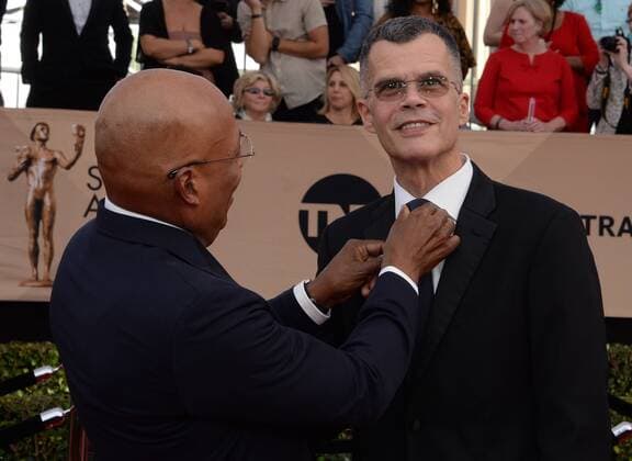 DGA President Paris Barclay (L) and Christopher Mason arrive for the 23rd annual SAG Awards held at the Shrine Auditorium in Los Angeles on January 29, 2017. The Screen Actors Guild Awards will be broadcast live on TNT and TBS.  LAP20170129851 JIMxRUYMEN