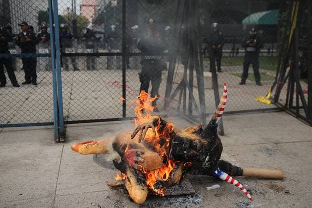 January 31, 2017 - Mexico City, Mexico - An alebrije, or sculpture of a fantastical creature, representing U.S. President Donald Trump with horns and a tail burns in front of the U.S. Embassy in Mexico City, Tuesday, Jan. 31, 2017. Thousands protested in the capital Tuesday, as rural residents from across the country denounced a gasoline price hike that has raised the price of tractor fuel, protested the governments of Mexico and the U.S., and called for the renegotiation of NAFTA to make it more favorable to small farmers. Mexico City Mexico - ZUMAn230 20170131_zaa_n230_276 Copyright: xEmilioxEspejelx