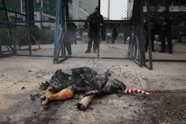 January 31, 2017 - Mexico City, Mexico - An alebrije, or sculpture of a fantastical creature, representing U.S. President Donald Trump with horns and a tail burns in front of the U.S. Embassy in Mexico City, Tuesday, Jan. 31, 2017. Thousands protested in the capital Tuesday, as rural residents from across the country denounced a gasoline price hike that has raised the price of tractor fuel, protested the governments of Mexico and the U.S., and called for the renegotiation of NAFTA to make it more favorable to small farmers. Mexico City Mexico - ZUMAn230 20170131_zaa_n230_278 Copyright: xEmilioxEspejelx