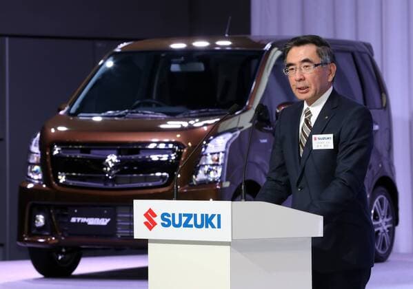 February 1, 2017, Tokyo, Japan - Japan s minicar maker Suzuki Motor president Toshihiro Suzuki displays the mini wagon Wagon R which has 660cc engine or engine electric-motor hybrid system to drive roomy body in Tokyo on February 1, 2017. The new Wagon R has various safety devices and minicar s first head-up display.  (lwxa007948)