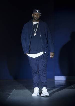 USA: The Blue Jacket Fashion Show CC Sabathia in John Varvatos dress walks runway for the blue jacket fashon show in support for prostate cancer awarness during New York Fashion week at Pier 59  LevxRadin