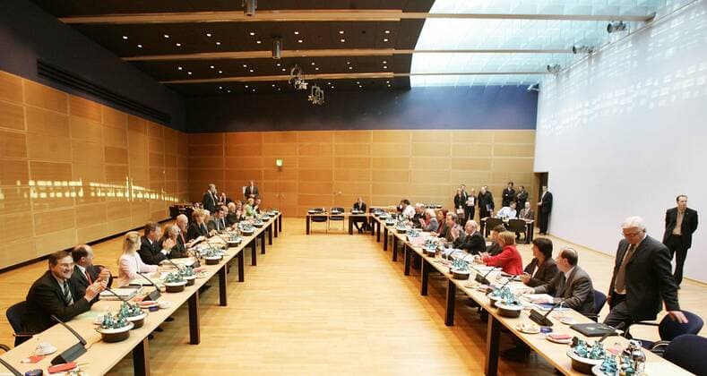 Oct 27, 2005 - Berlin, GERMANY - After the inconclusive result of the 2005 German federal election, neither of the traditional coalitions could form a majority government and so the formation of a new government required careful negotiations. Finally, on October 10, officials from the CDU CSU and the SPD announced that negotiations had concluded successfully on forming a Grand Coalition with Angela Merkel as a Chancellor. Detailed negotiations on the formation of the new government continued into November. PICTURED: Overview of the negotiation room. - ZUMAkg1_ 20051027_olc_k98_822 Copyright: xJochenxZickx