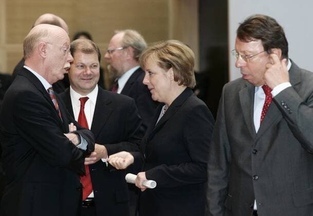 Oct 27, 2005 - Berlin, GERMANY - After the inconclusive result of the 2005 German federal election, neither of the traditional coalitions could form a majority government and so the formation of a new government required careful negotiations. Finally, on October 10, officials from the CDU CSU and the SPD announced that negotiations had concluded successfully on forming a Grand Coalition with Angela Merkel as a Chancellor. Detailed negotiations on the formation of the new government continued into November. PICTURED: Minister of Defence PETER STRUCK, SPD politician OLAF SCHOLZ, Designated Chancellor and CDU CSU Chairwoman ANGELA MERKEL and Secretary General of SPD KLAUS UWE BENNETER. - ZUMAkg1_ 20051027_olc_k98_826 Copyright: xJochenxZickx