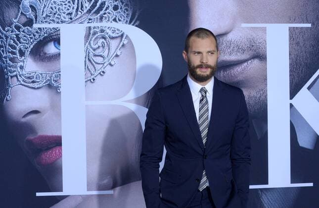 Cast member Jamie Dornan attends the Fifty Shades Darker premiere at the Ace Hotel Theatre in Los Angeles on February 2, 2017. Storyline: While Christian wrestles with his inner demons, Anastasia must confront the anger and envy of the women who came before her.  LAP2017020201 JIMxRUYMEN