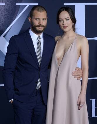 Cast members Jamie Dornan and Dakota Johnson attend the Fifty Shades Darker premiere at the Ace Hotel Theatre in Los Angeles on February 2, 2017. Storyline: While Christian wrestles with his inner demons, Anastasia must confront the anger and envy of the women who came before her.  LAP2017020208 JIMxRUYMEN