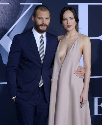 Cast members Jamie Dornan and Dakota Johnson attend the Fifty Shades Darker premiere at the Ace Hotel Theatre in Los Angeles on February 2, 2017. Storyline: While Christian wrestles with his inner demons, Anastasia must confront the anger and envy of the women who came before her.  LAP2017020209 JIMxRUYMEN