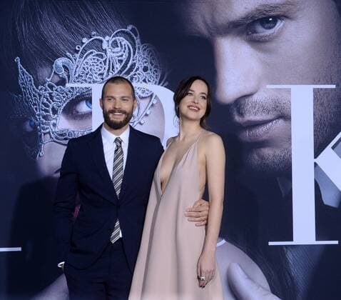 Cast members Jamie Dornan and Dakota Johnson attend the Fifty Shades Darker premiere at the Ace Hotel Theatre in Los Angeles on February 2, 2017. Storyline: While Christian wrestles with his inner demons, Anastasia must confront the anger and envy of the women who came before her.  LAP2017020211 JIMxRUYMEN