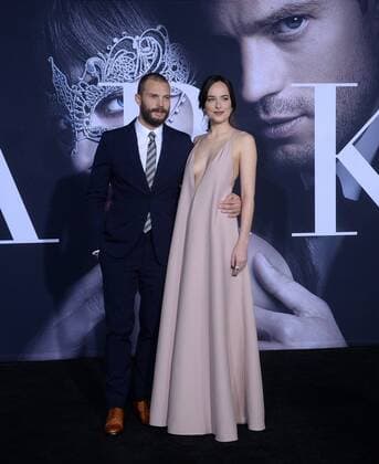 Cast members Jamie Dornan and Dakota Johnson attend the Fifty Shades Darker premiere at the Ace Hotel Theatre in Los Angeles on February 2, 2017. Storyline: While Christian wrestles with his inner demons, Anastasia must confront the anger and envy of the women who came before her.  LAP2017020214 JIMxRUYMEN