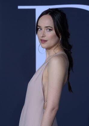 Cast member Dakota Johnson attends the Fifty Shades Darker premiere at the Ace Hotel Theatre in Los Angeles on February 2, 2017. Storyline: While Christian wrestles with his inner demons, Anastasia must confront the anger and envy of the women who came before her.  LAP2017020216 JIMxRUYMEN