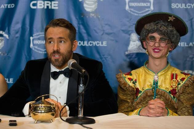Actor Ryan Reynolds (L) answers questions from reporters with Harvard student Dan Milaschewski in costume to his right after Reynolds was awarded the Harvard University Hasty Pudding Theatricals 2017 Man of the Year inside Farkas Hall in Cambridge, Massachusetts on February 3, 2017.  BOS20170203005 MATTHEWxHEALEY