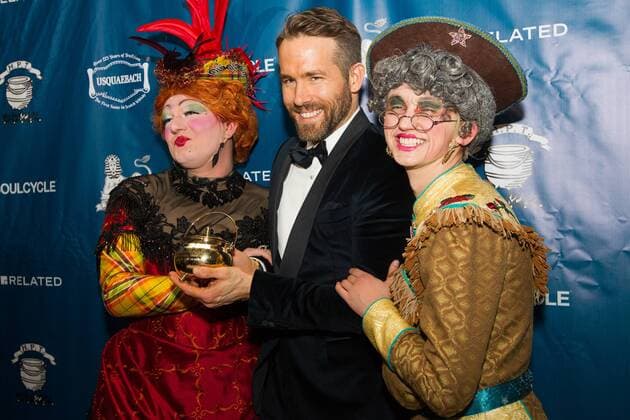 Actor Ryan Reynolds (C) poses with his Pudding Pot trophy with Harvard students Dylan Peterson (L) and Dan Milaschewski in costume, after Reynolds was awarded the Harvard University Hasty Pudding Theatricals 2017 Man of the Year inside Farkas Hall in Cambridge, Massachusetts on February 3, 2017.  BOS20170203008 MATTHEWxHEALEY