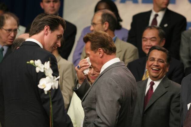 Jun 01, 2005; San Francisco, CA, USA; Governor ARNOLD SCHWARZENEGGER takes a moment to wipe his sweaty face and in the process, smears his makeup. San Francisco Mayor GAVIN NEWSOM and Governor Schwarzenegger who announced greenhouse gas (GHG) emission reduction targets for California at the United Nations World Environment Day in San Francisco. The Governor signed Executive Order S-3-05 which establishes these GHG targets and charges the California Environmental Protection Agency secretary with the coordination of the oversight of efforts to achieve them. The event was held at San Francisco City Hall..  - ZUMAjpg 20050601_cob_a10_108 Copyright: xDanexAndrewx