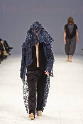 February 8, 2017 - Kiev, Ukraine - A model presents a creation by Ukrainian designer Nikita Melenevskiy during the Ukrainian Fashion Week FW 2017 18, at Mystetskyi Arsenal in Kiev, Ukraine, 08 February 2017. The event presents Autumn-Winter 2017 18 collections by Ukrainian and International designers, from 4 to 8 February Kiev Ukraine  - ZUMAn230 20170208_zaa_n230_442 Copyright: xStrx