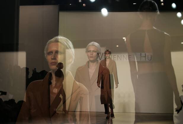 The multiple exposure photo taken on Feb. 12, 2017 shows models presenting creations of Vivienne Hu during the 2017 New York Fashion Week in New York City, the United States. ) (zhf) U.S.-NEW YORK-FASHION-VIVIENNE HU QinxLang 