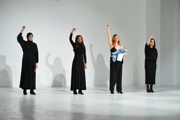 Women make a political statement on the runway at the Mara Hoffman fashion show at New York Fashion Week: The Shows at Shop Studios on February 13, 2017 in New York City.  NYP201702131029 ANDREAxHANKS