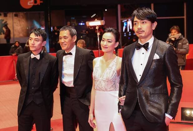 BERLIN, Feb. 13, 2017 -- Director Sabu (2nd L), actor Chang Chen (1st L), actress Yao Yiti (2nd R) and actor Sho Aoyagi pose for photos on the red carpet for the premiere of film Mr. Long during the 67th Berlin International Film Festival in Berlin, capital of Germany, on Feb. 13, 2017. ) (zy) GERMANY-BERLIN-67TH BERLINALE- MR. LONG ShanxYuqi 