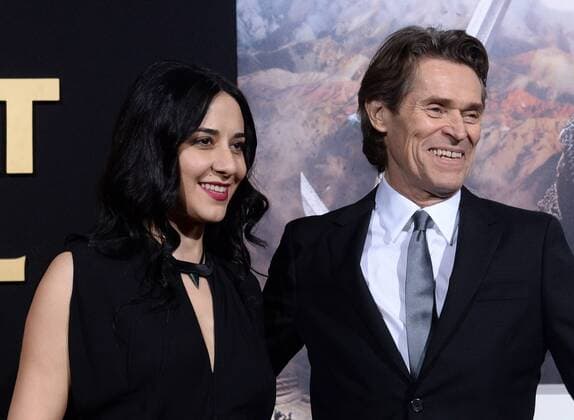Cast member Willem Dafoe and his wife Giada Colagrande attend the premiere of the motion picture fantasy thriller The Great Wall at the TCL Chinese Theatre in the Hollywood section of Los Angeles on February 15, 2017. Storyline: European mercenaries searching for black powder become embroiled in the defense of the Great Wall of China against a horde of monstrous creatures.  LAP2017021517 JIMxRUYMEN