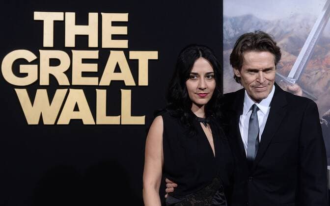 Cast member Willem Dafoe and his wife Giada Colagrande attend the premiere of the motion picture fantasy thriller The Great Wall at the TCL Chinese Theatre in the Hollywood section of Los Angeles on February 15, 2017. Storyline: European mercenaries searching for black powder become embroiled in the defense of the Great Wall of China against a horde of monstrous creatures.  LAP2017021516 JIMxRUYMEN