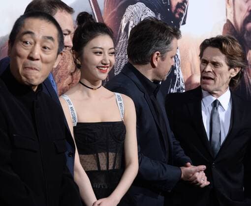 Director Yimou Zhang and cast members Tian Jing, Matt Damon and Willem Dafoe (L-R) mingle on the red carpet during the premiere of the motion picture fantasy thriller The Great Wall at the TCL Chinese Theatre in the Hollywood section of Los Angeles on February 15, 2017. Storyline: European mercenaries searching for black powder become embroiled in the defense of the Great Wall of China against a horde of monstrous creatures.  LAP2017021522 JIMxRUYMEN