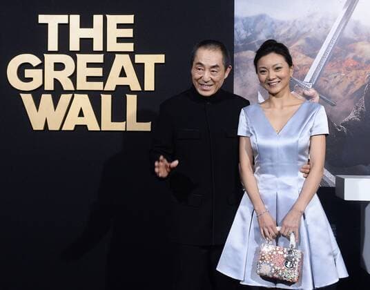 Director Yimou Zhang and his wife Chen Ting attend the premiere of his new motion picture fantasy thriller The Great Wall at the TCL Chinese Theatre in the Hollywood section of Los Angeles on February 15, 2017. Storyline: European mercenaries searching for black powder become embroiled in the defense of the Great Wall of China against a horde of monstrous creatures.  LAP2017021532 JIMxRUYMEN