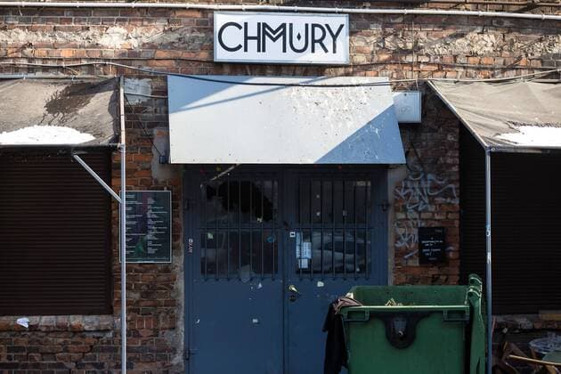 Attack on AFC Ajax fans in Warsaw An exterior view of the Chmury (Clouds) club in Warsaw s northern Praga district where AFC Ajax fans were attacked overnight on February 16, 2016 in Warsaw, Poland. It was stated, that a group of about a 50 black-clothed emblemless attackers threw bottles and stones at the club where the Dutch fans, who are in Warsaw for UEFA Europa League Legia vs. AFC Ajax match, were gathering at night. The group of aggressors fled the site just before the arrival of police while Ajax fans barricaded themselves inside the hostel where they are staying. No causalities were reported. EN_01245927_0011 