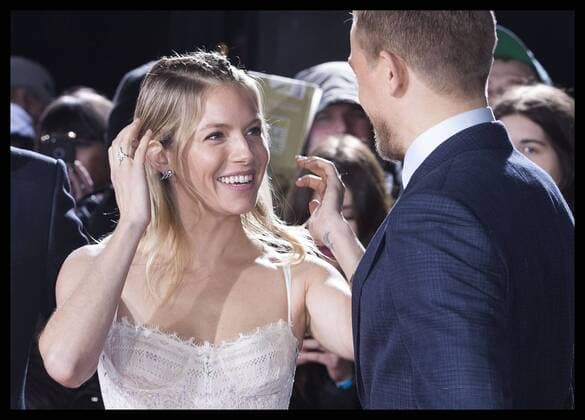 . 16 02 2017. London, United Kingdom. Sienna Miller and Charlie Hunnam arriving at The Lost City of Z premiere in London.  xStephenxLockx xi-Imagesx IIM-14400-0033